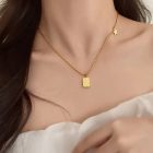 minimalist gold pendant necklace